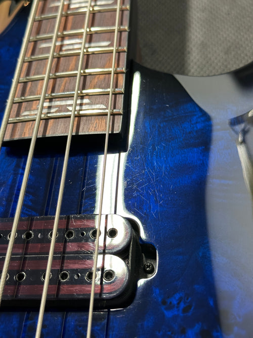 Used Schecter Omen Elite-4 (2021) - See-Thru Blue Burst #10310 with Gig Bag