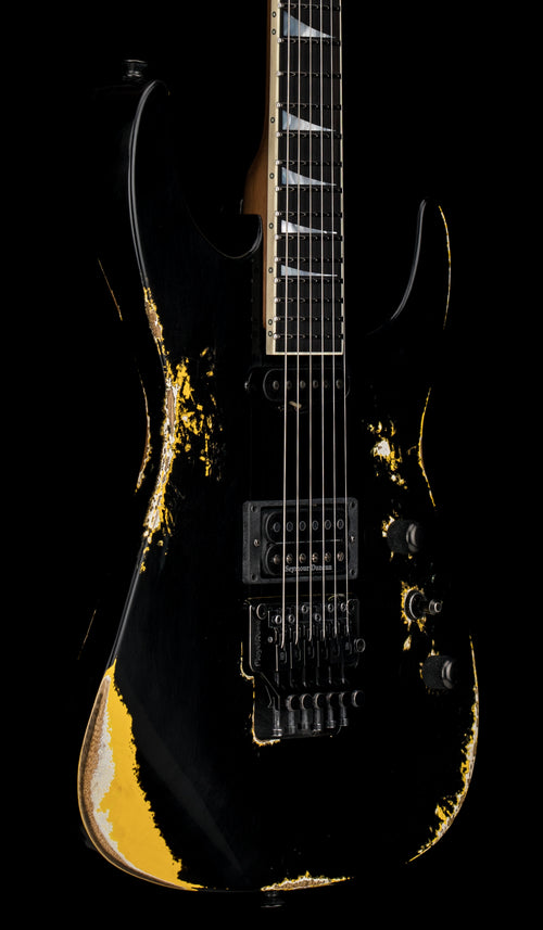Jackson Custom Shop Korina DK HS FR Heavy Relic - Black over Graffiti Yellow #20654 (Empire Music Spec)